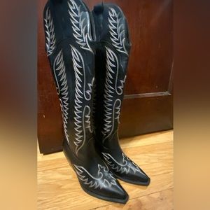 Knee high black cowgirl boots
